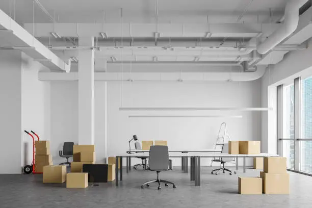  Employees packing boxes for office relocation