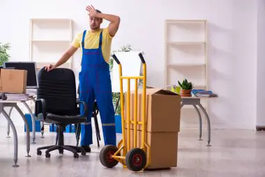 Employees working in a dedicated work area during office relocation